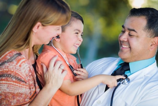 mother and boy patient with doctor